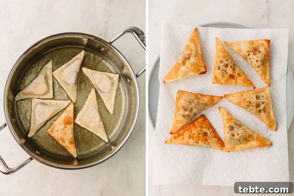 Crispy Banana and Nutella Wontons Recipe for Dessert Delight 8 Banana Nutella wontons frying in a pot and draining on a paper towel.