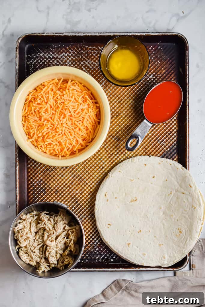 Ingredients for the buffalo chicken sheet pan quesadillas