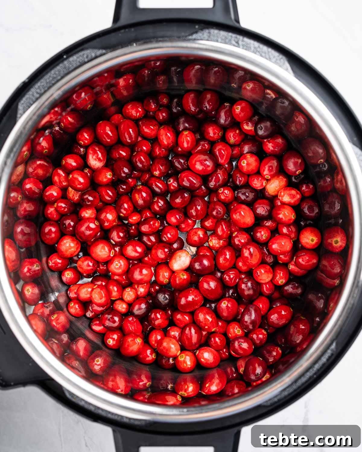 Cranberry Sauce for Instant Pot: Quick Holiday Recipe 6 Instant pot with fresh cranberries.