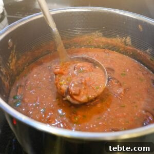 Authentic New Orleans Red Beans and Rice Recipe 6 Red beans and sausage in a pot.