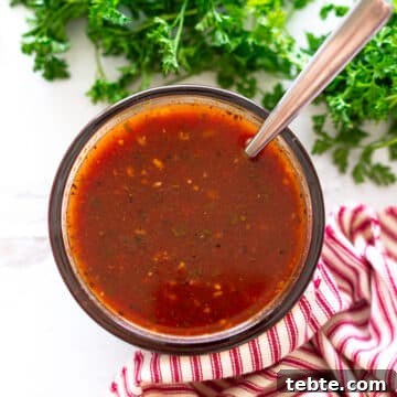 Homemade Red Enchilada Sauce Recipe for Authentic Flavor 14 Bowl of homemade red enchilada sauce on a counter.