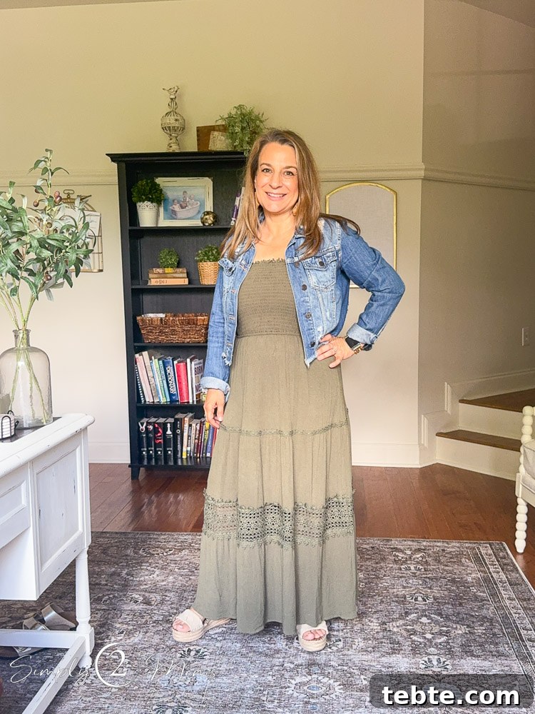 8 Adorable Amazon Jumpsuits and Sundresses You’ll Love 18 Woman wearing a strapless sundress with tiered skirt and lace detail with a cropped denim jacket.