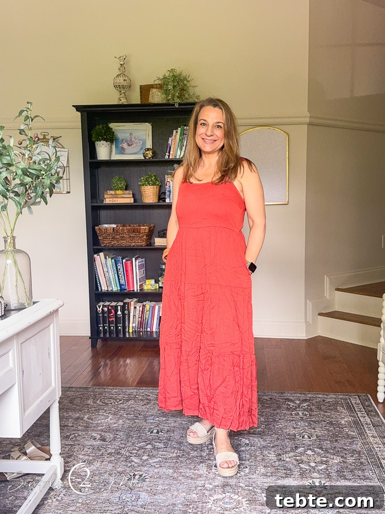 8 Adorable Amazon Jumpsuits and Sundresses You’ll Love 21 Woman wearing a tiered ruffled sundress with fitted bodice.