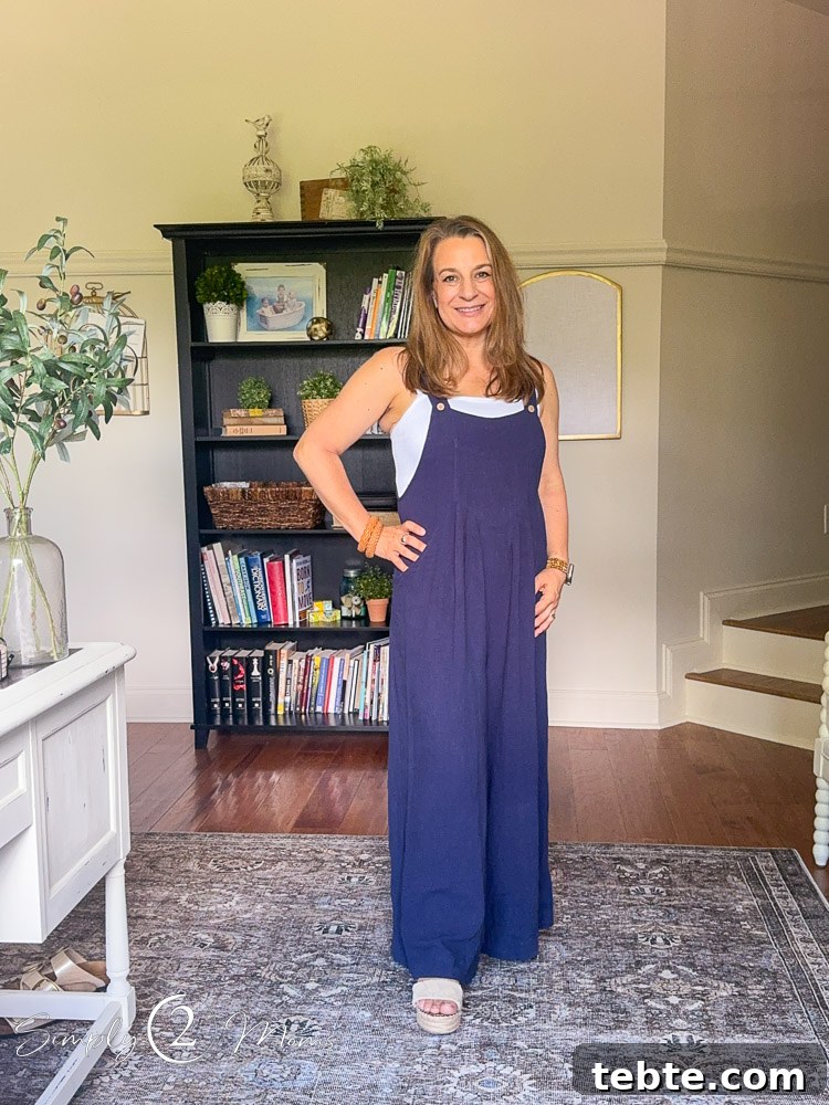 8 Adorable Amazon Jumpsuits and Sundresses You’ll Love 5 Woman wearing wide legged overalls with sleeveless body suit with pockets.