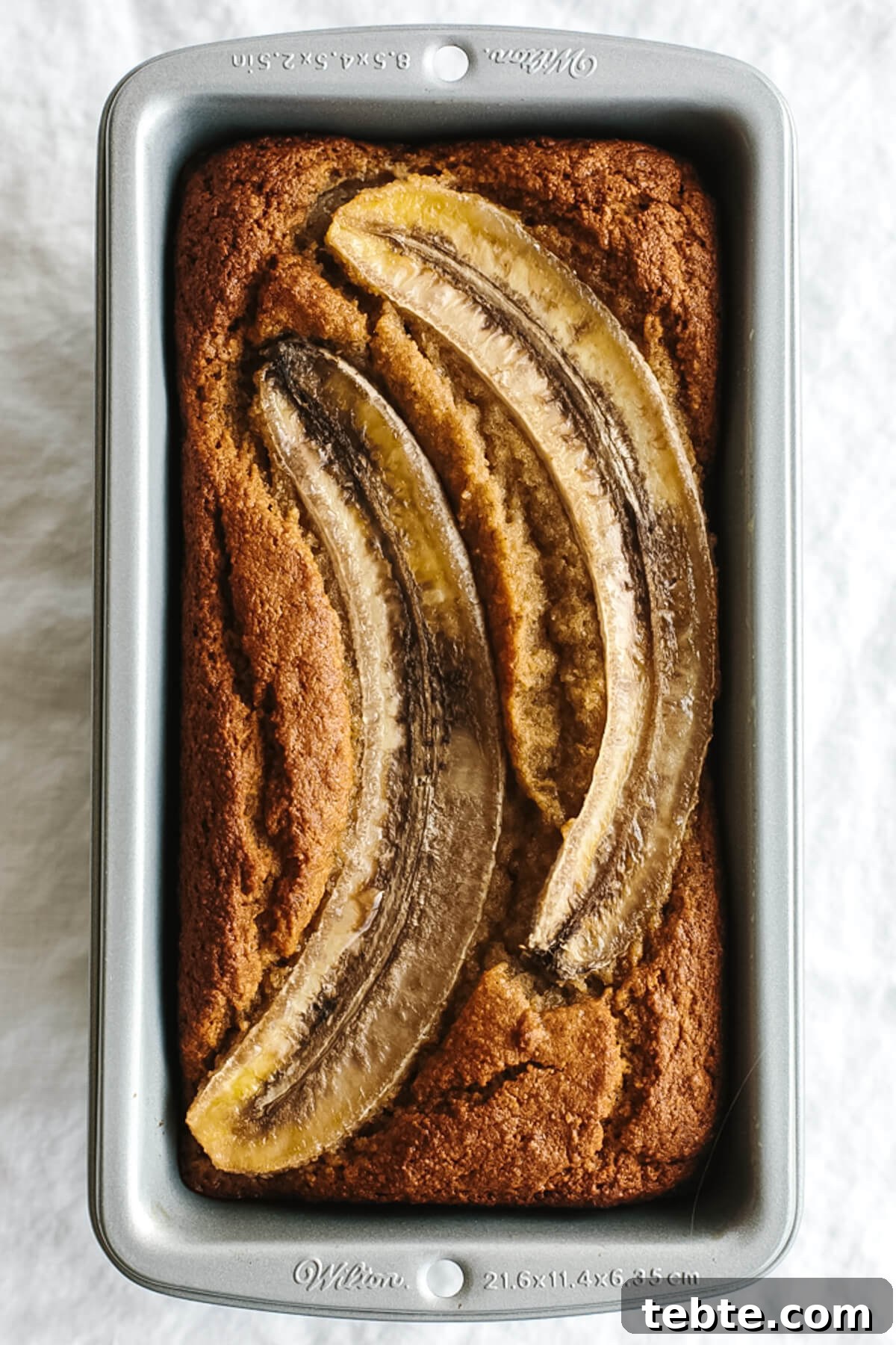 Paleo banana bread in a loaf pan.