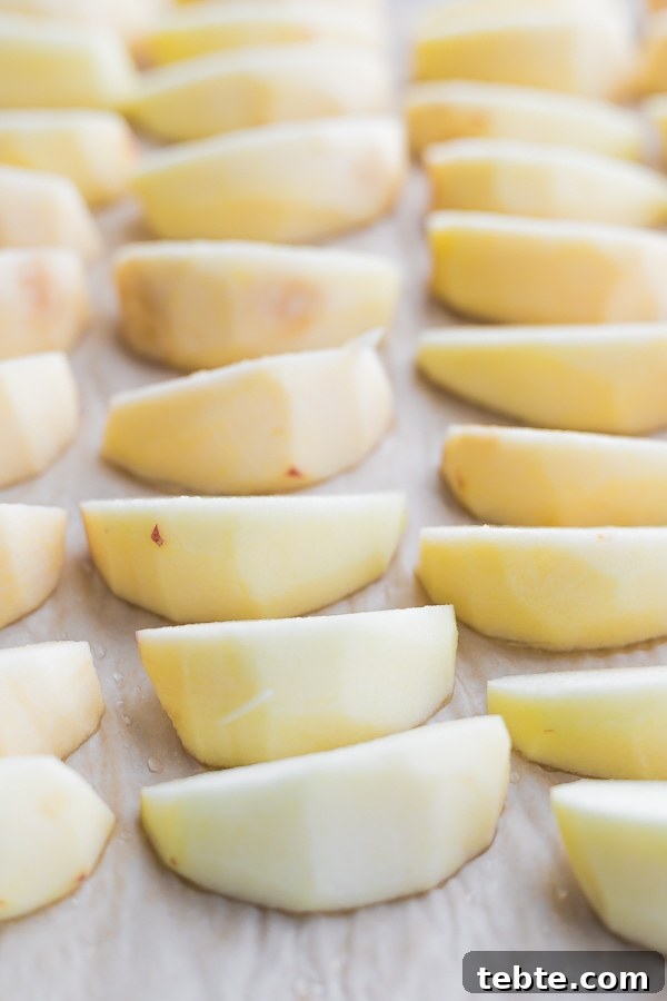30+ Proven Methods for Preserving Apples All Year Round 25 Freezing Apples on a Cookie Sheet (Image Courtesy of Sweet Peas and Saffron)