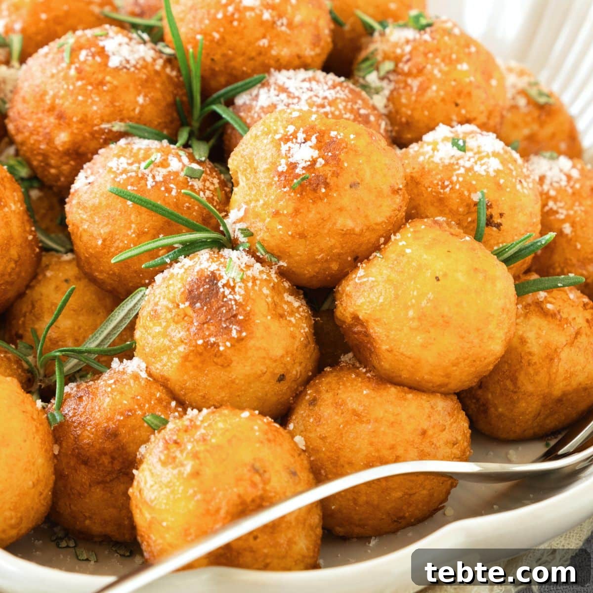 76 Gluten-Free Game Day Snacks to Share with Friends 11 A plate of crispy fried potato balls