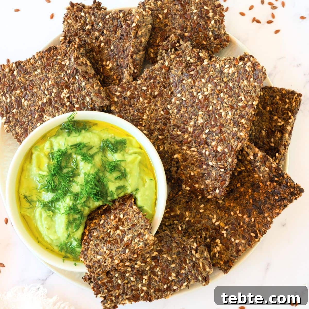 76 Gluten-Free Game Day Snacks to Share with Friends 14 Flaxseed crackers and guacamole