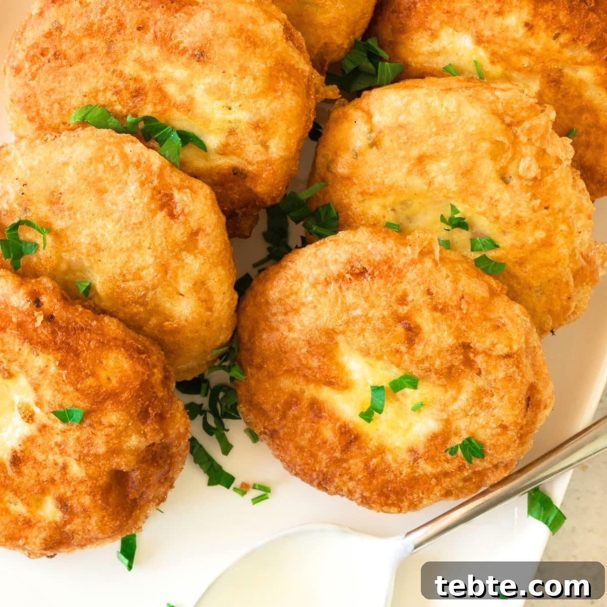 76 Gluten-Free Game Day Snacks to Share with Friends 10 Many potato cakes on plate.