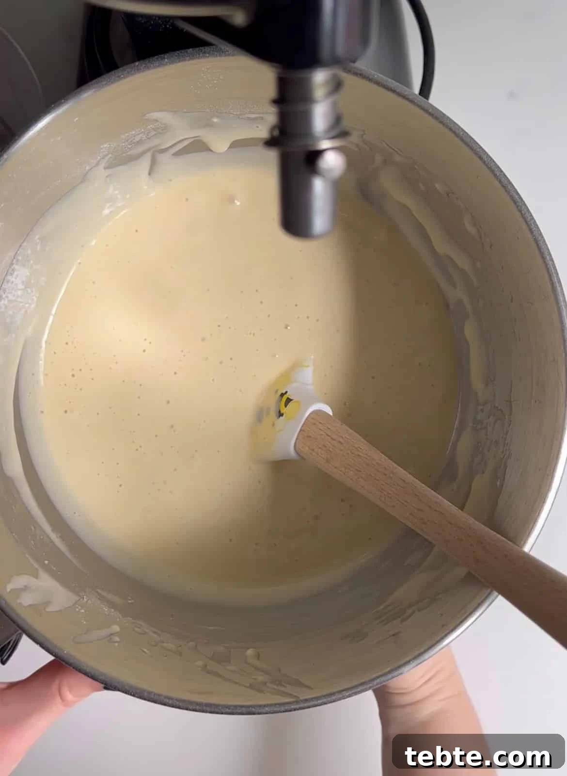 5 Essential Baking Tools Every Home Baker Needs 4 Folding the batter together.