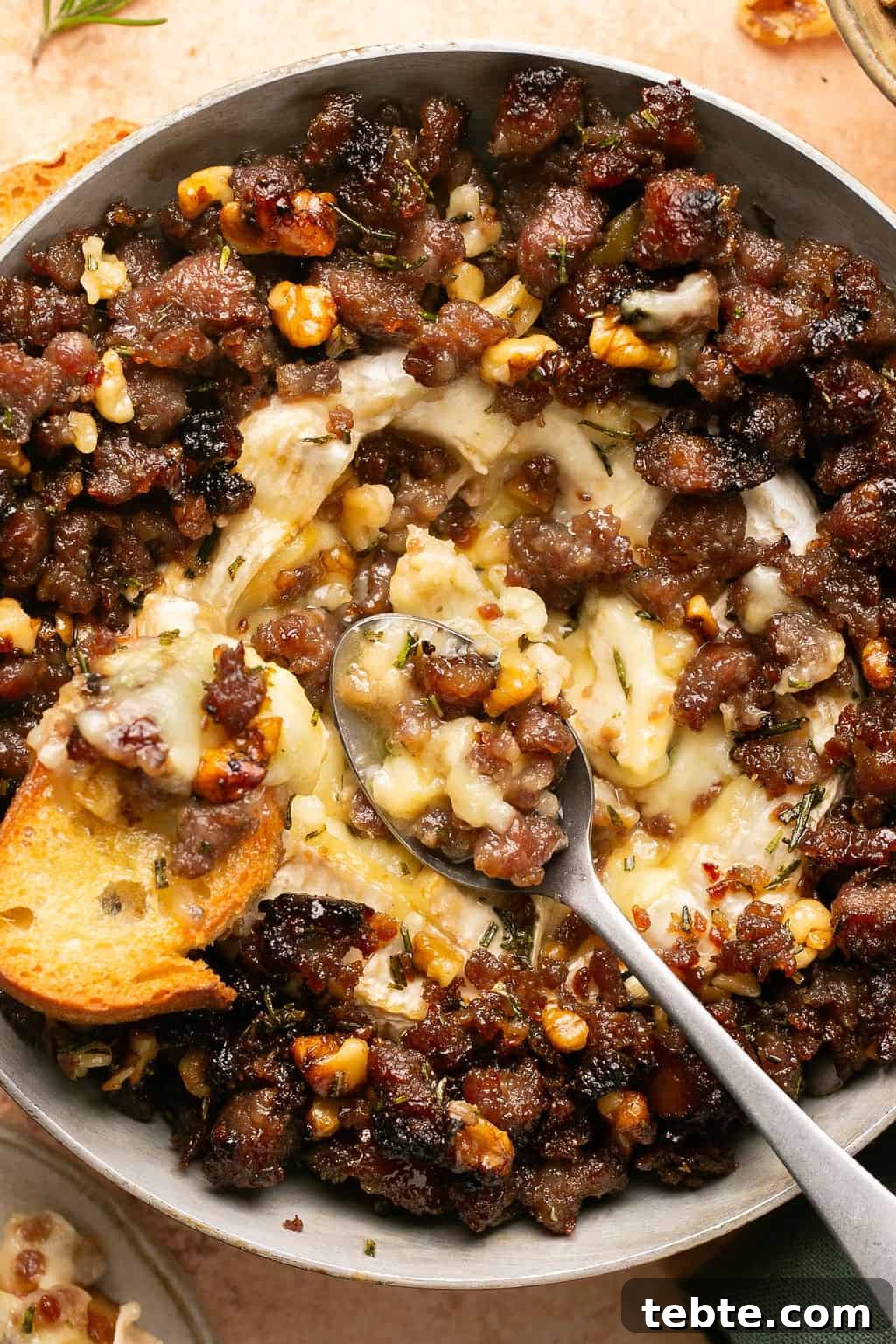 Sausage-Stuffed Baked Brie with Honey and Herbs 7 sausage baked brie