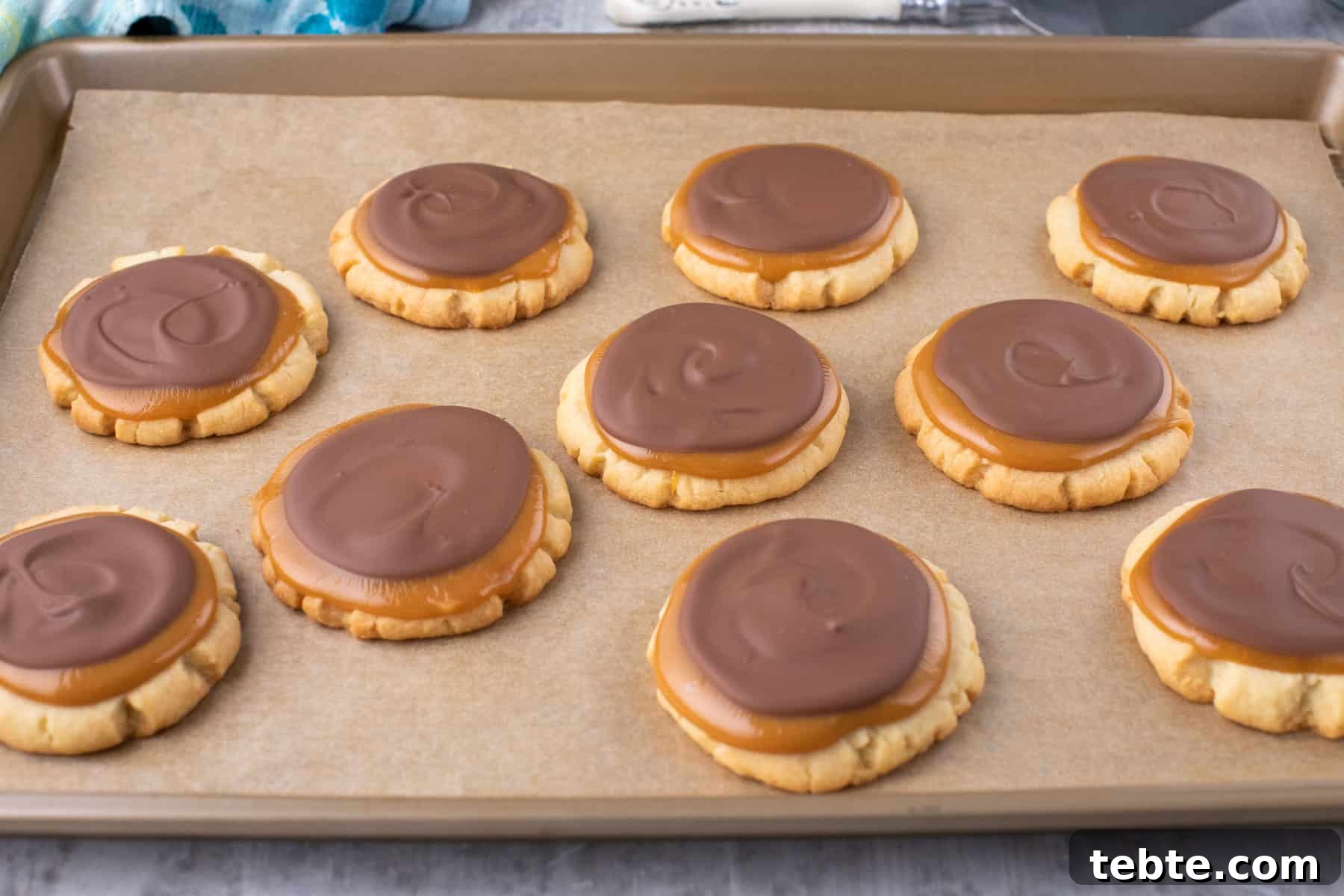 twix cookies on a cookies sheet.