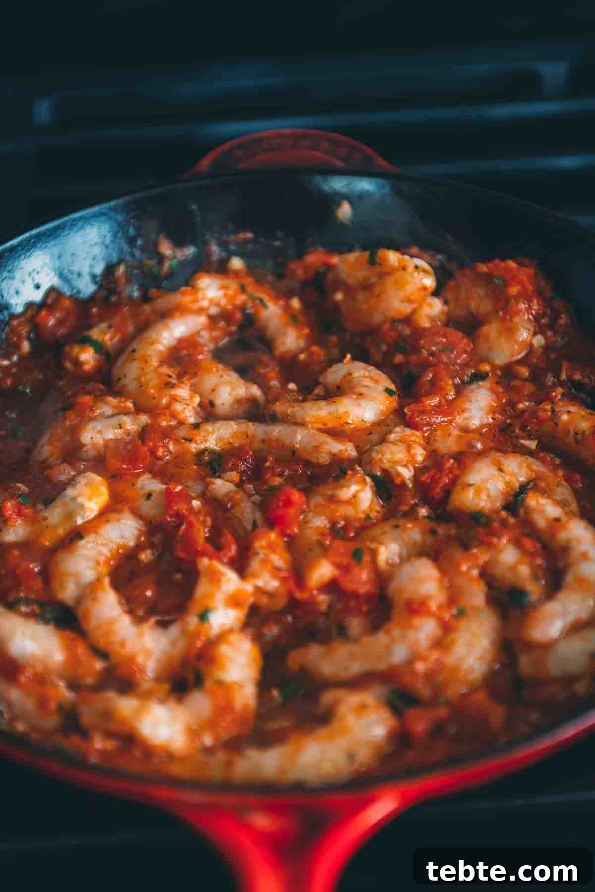 Crispy Halloumi Shrimp Saganaki with Tomato and Feta 8 Shrimp simmering in tomato sauce.