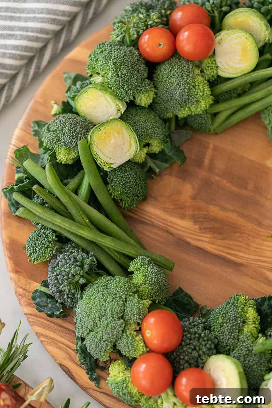 Broccoli, green beans, and tomatoes to make a wreath.