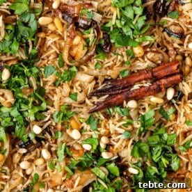Authentic Middle Eastern Rice Pilaf Recipe with Aromatic Spices 11 close up of herbs and spices in baked basmati rice