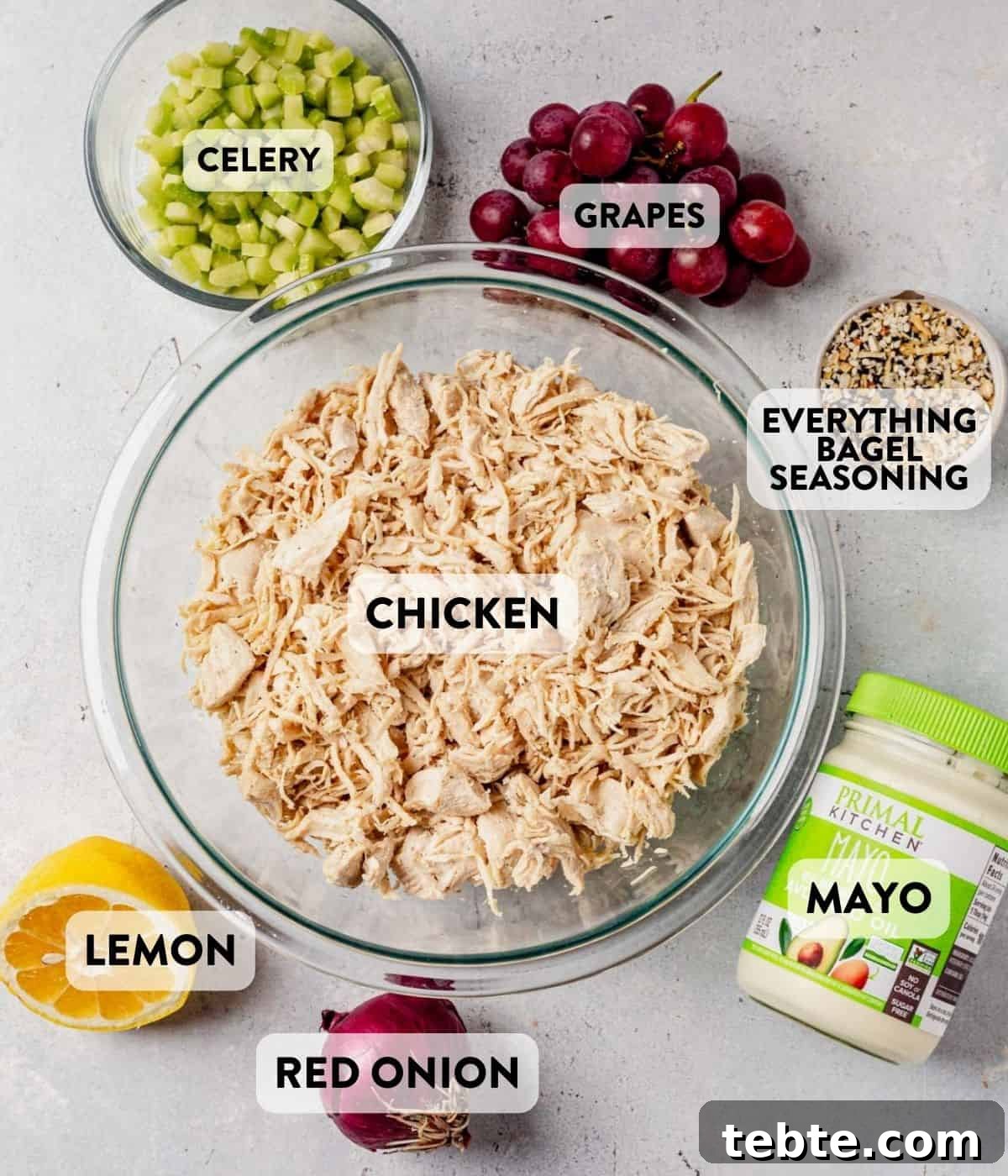 everything bagel chicken salad ingredients on a counter