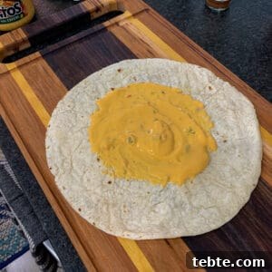 tortilla and queso for pulled pork crunch wrap