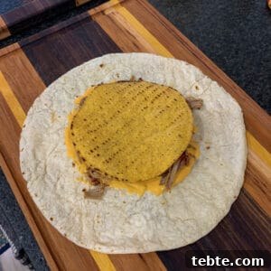 tostada shell over toppings and a tortilla