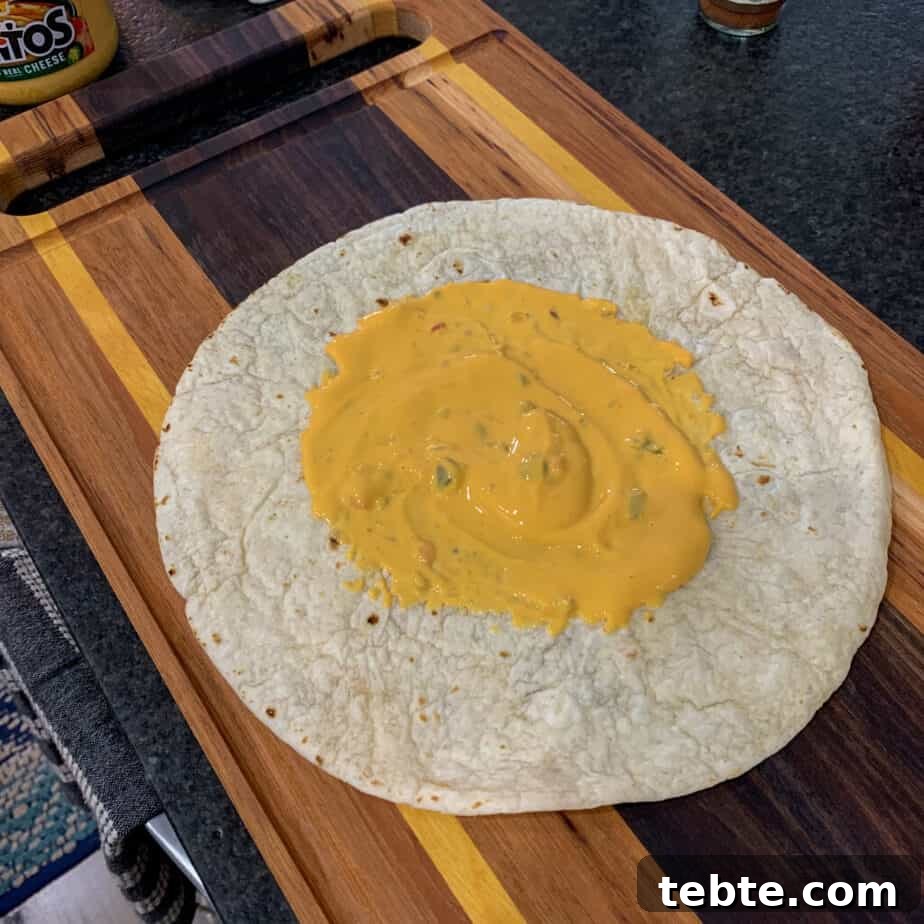 tortilla and queso for pulled pork crunch wrap