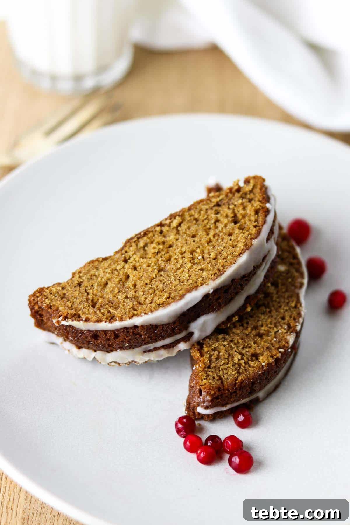 Swedish Spice Cake on a plate with lingonberries.