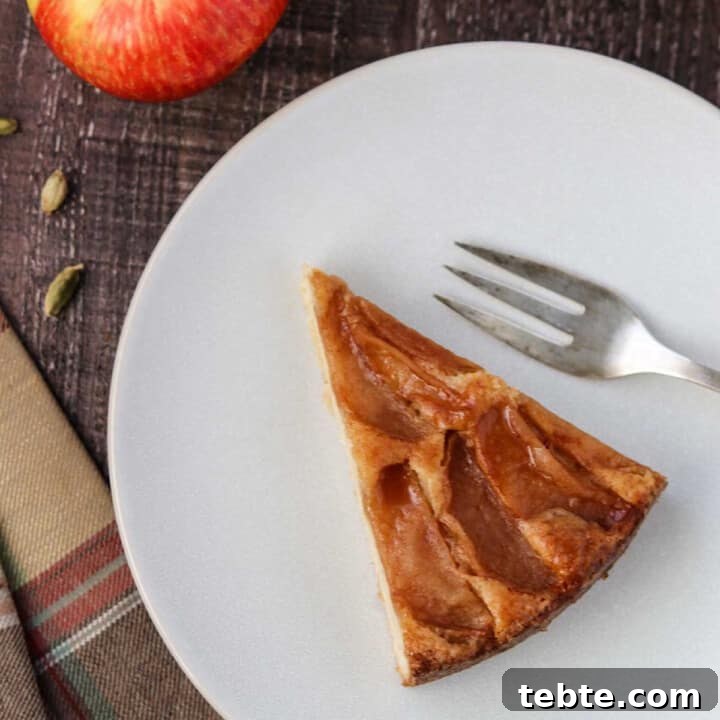 Close up of a slice of Swedish Apple Cake.