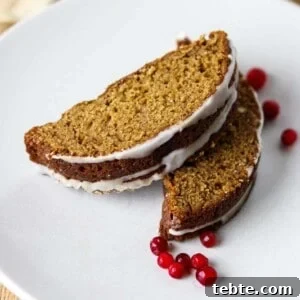 Close up of slices of Swedish Spice Cake with lingonberries.
