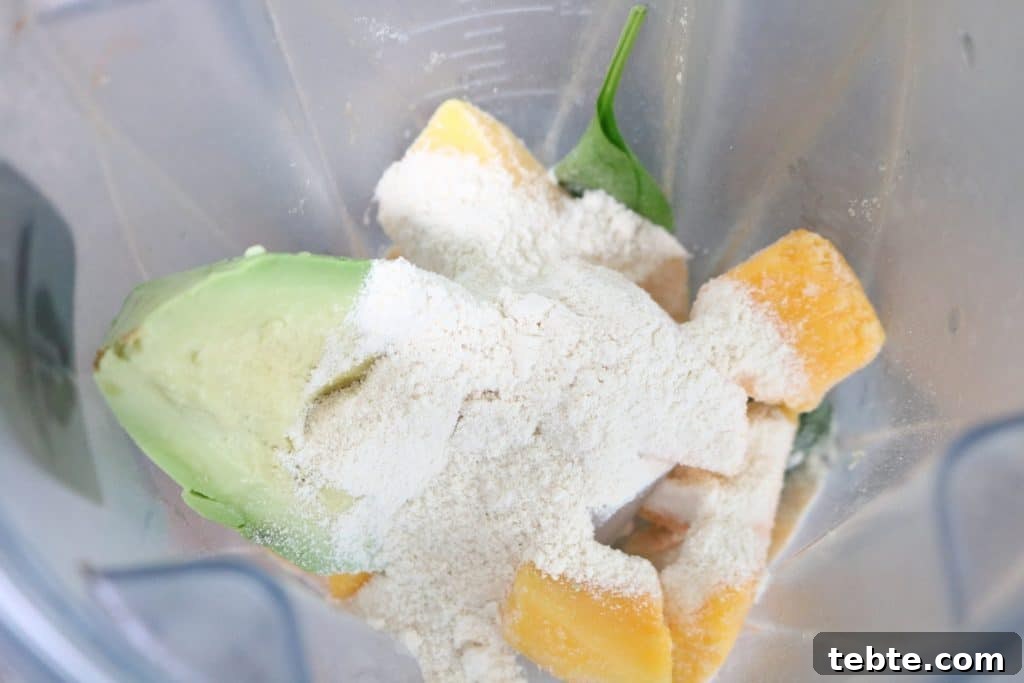 Mango Avocado Smoothie Without Banana — Creamy Tropical Drink 5 Avocado, frozen mango, and protein powder all in a blender