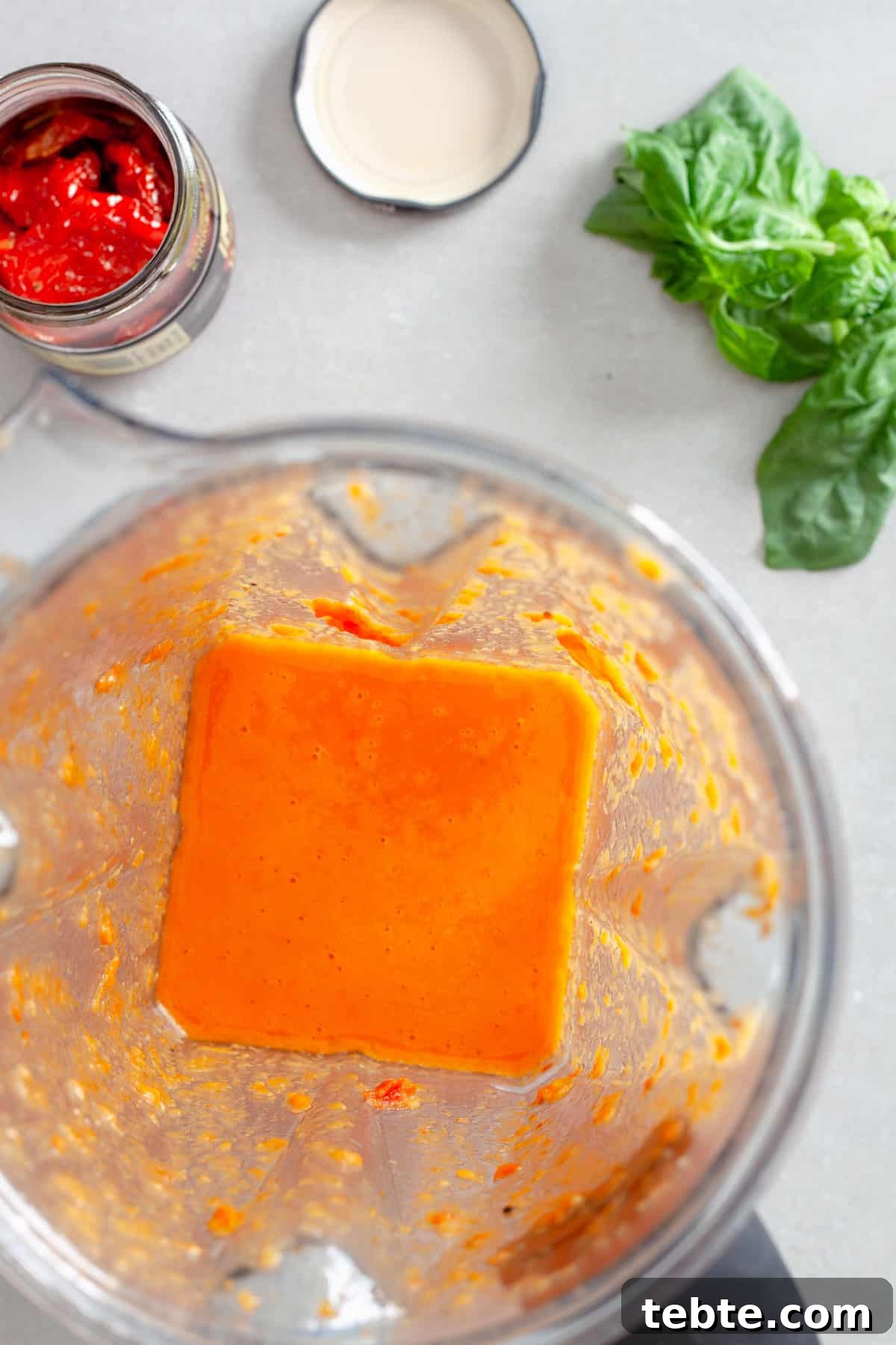 Sun-Dried Tomato Vinaigrette Recipe for Bright, Tangy Salads 6 A blender with sun-dried vinaigrette just blended to a smooth consistency.