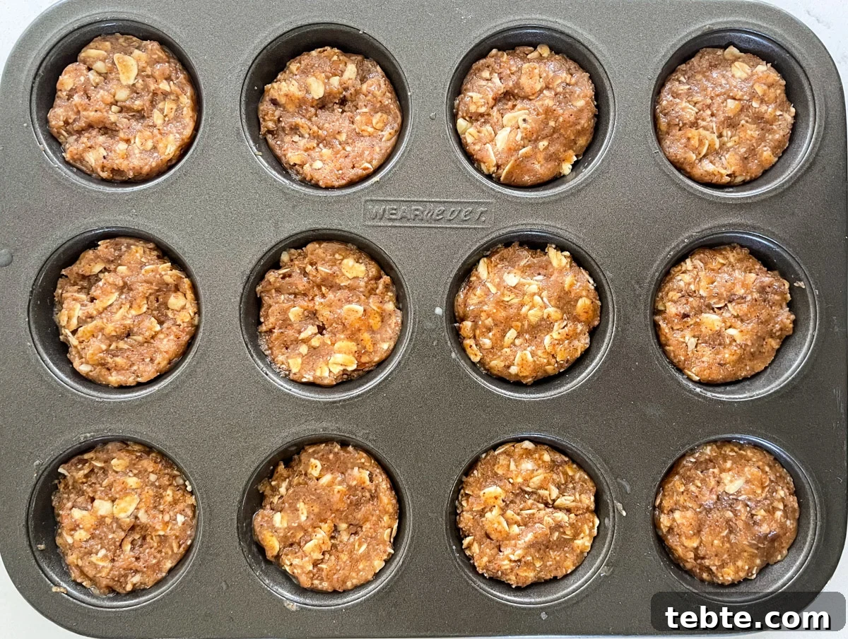 No-Bake Chocolate Almond Oat Cups — Dairy & Gluten Free 6 full mini muffin tin with pressed dough