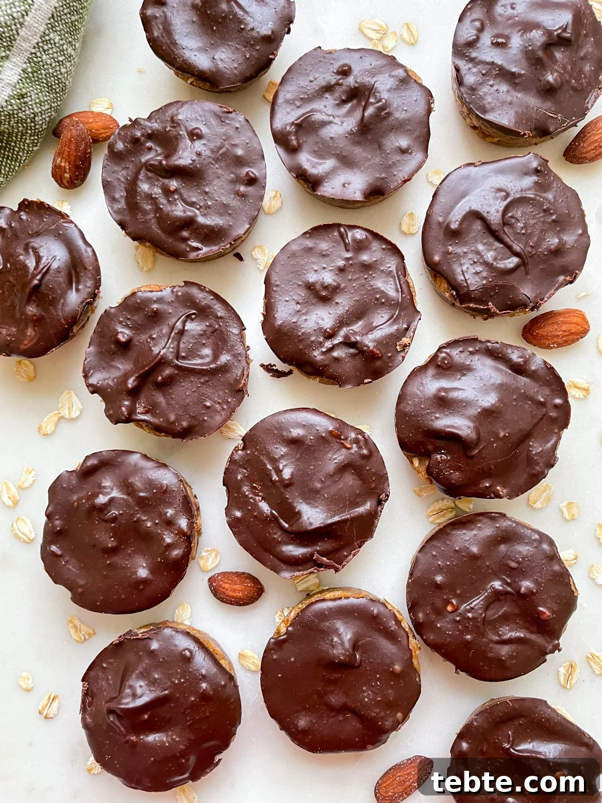 No-Bake Chocolate Almond Oat Cups — Dairy & Gluten Free 8 finished oat cups from above on white counter