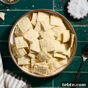 Crispy Sourdough Discard Crackers: Crunchy Homemade Recipe 13 Sourdough Discard Crackers in a bowl.