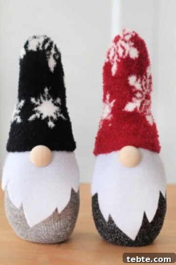 Two sock gnomes on a table.