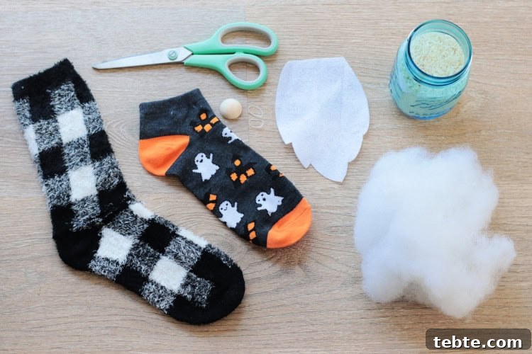 No-Sew Halloween Gnomes Made from Socks 3 two socks, scissors, bead, stuffing, rice, scissors
