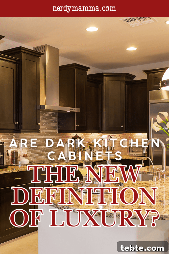 Are Dark Kitchen Cabinets the New Standard of Luxury? 4 A stylish kitchen with glossy dark cabinets and granite countertops illuminated by modern pendant lighting.