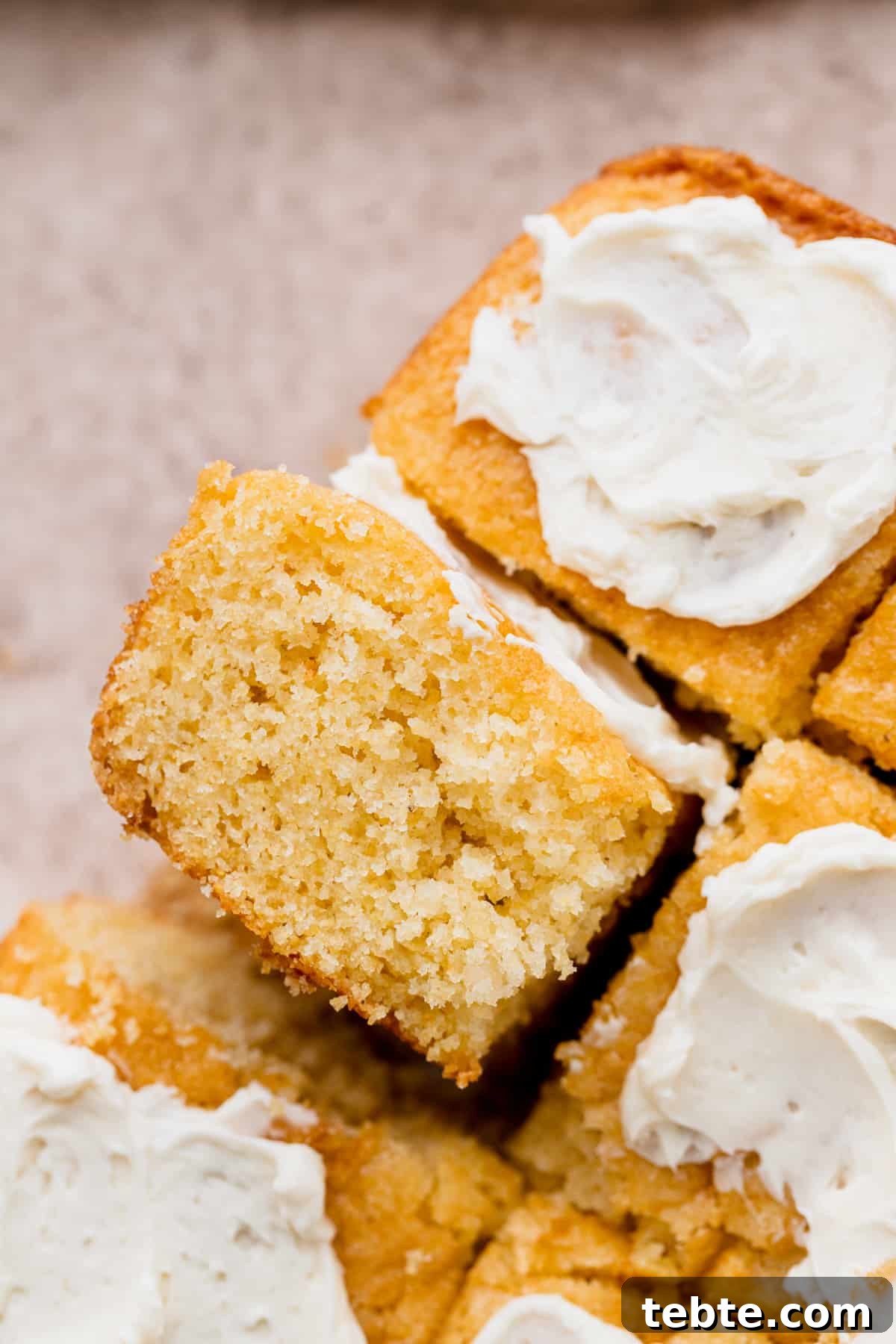Honey Butter Cornbread Recipe: Sweet, Buttery Southern Cornbread 11 A piece of honey butter cornbread on its side.