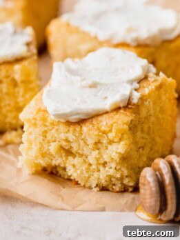 Honey Butter Cornbread Recipe: Sweet, Buttery Southern Cornbread 12 Honey butter cornbread with butter on top.