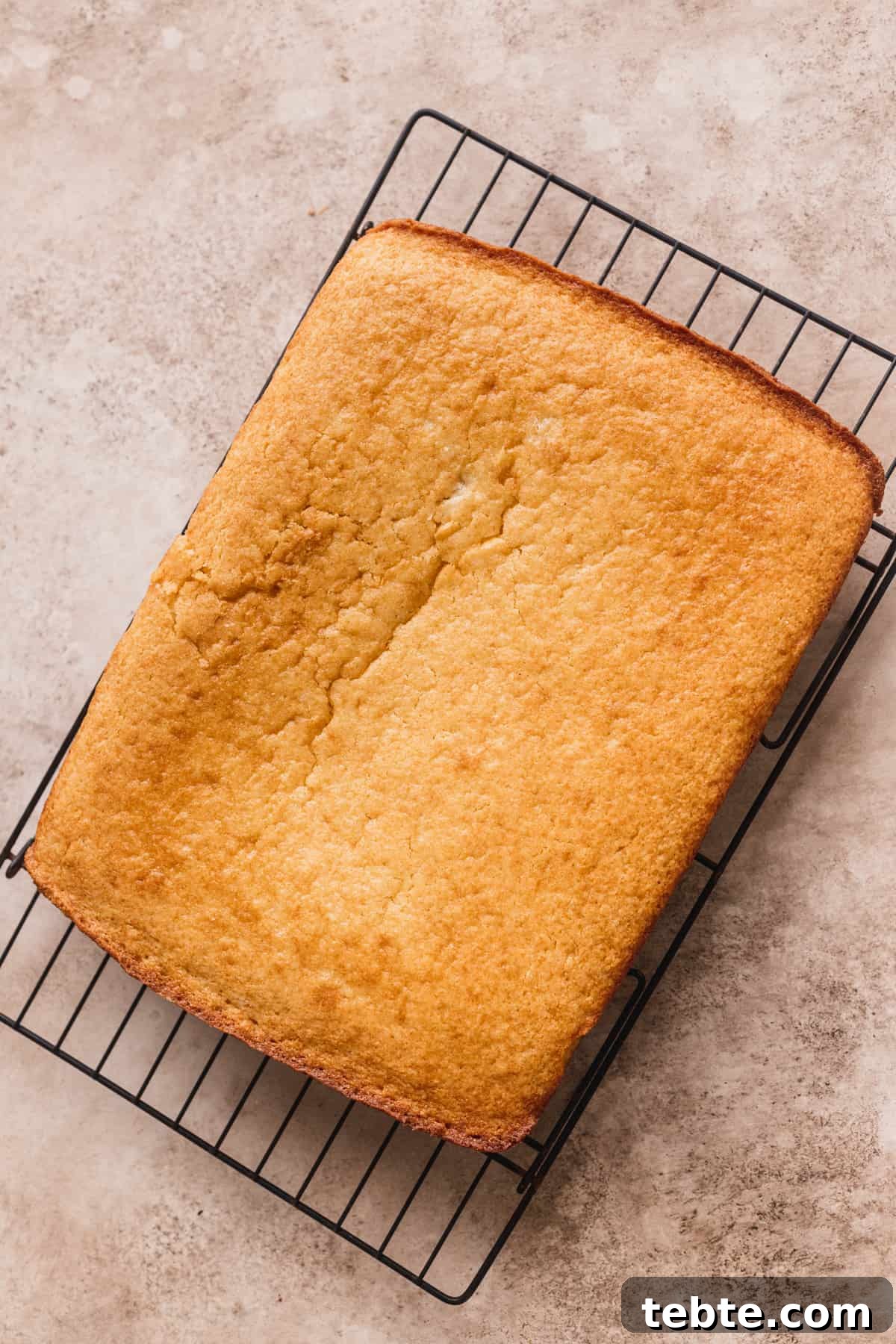 Honey Butter Cornbread Recipe: Sweet, Buttery Southern Cornbread 8 Cornbread on a wire rack.
