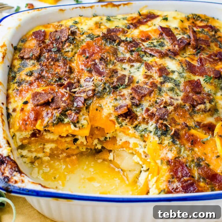 Savory Sweet Potato Casserole with Herbed Panko Topping 9 Scooping a savory baked potato and bacon casserole.