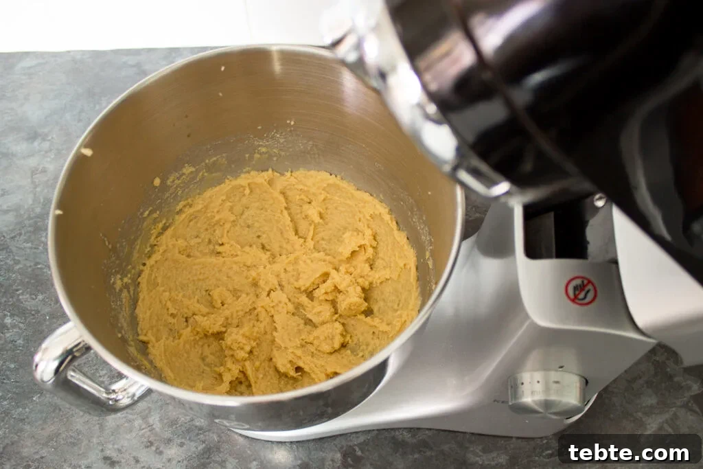 Custard and White Chocolate Cookies Recipe for Crisp, Creamy Treats 7 Butter, sugar and egg, beaten together in an electric stand mixer.