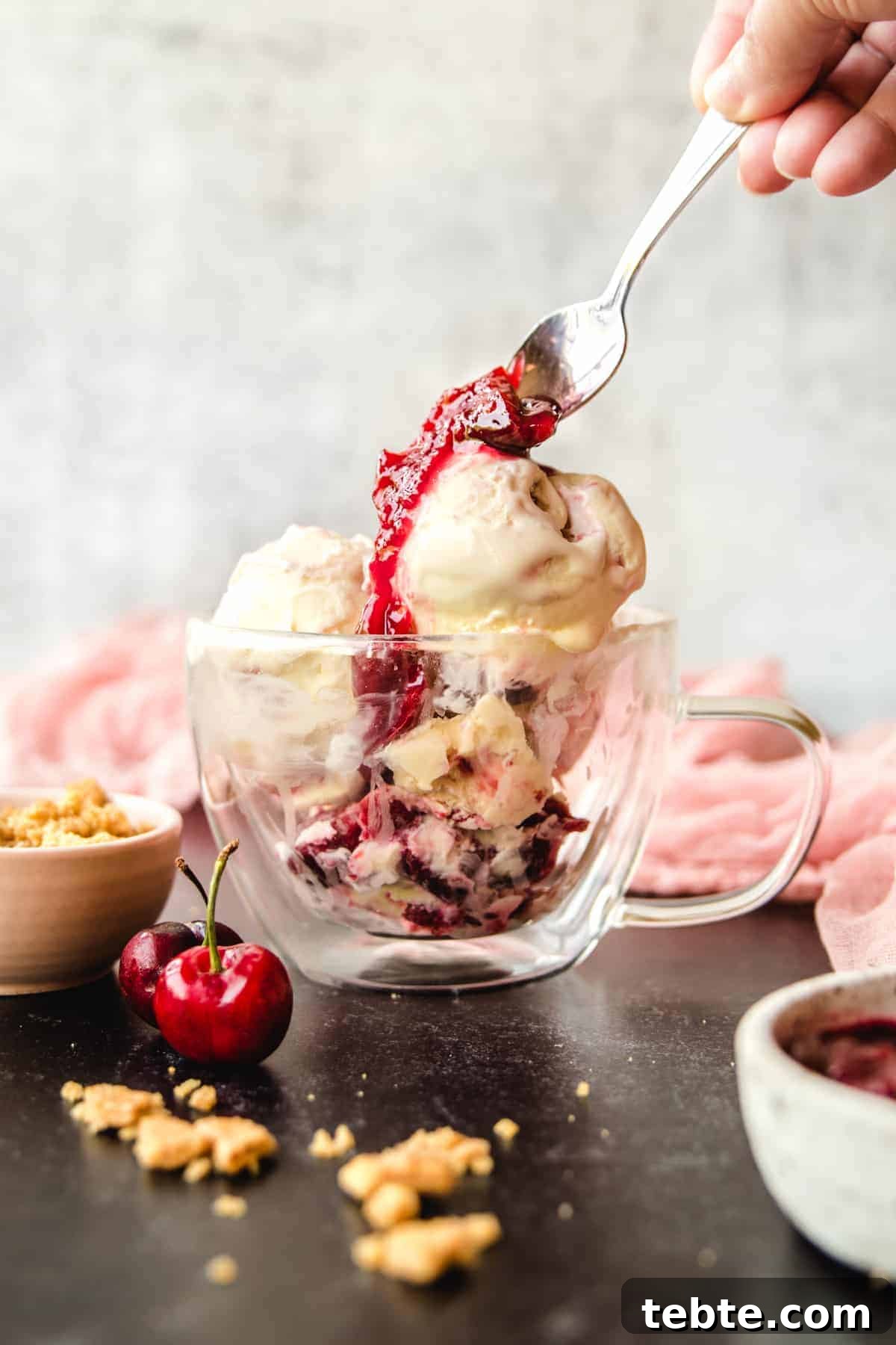 This bourbon cherry cheesecake ice cream is full of flavor and easy enough for you to make at home to enjoy any time.