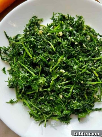 plate of stir-fried carrot greens