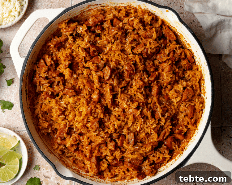 Spanish rice and chorizo baked in a skillet.