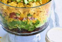 Layered Southwestern Salad with Corn, Black Beans, and Avocado