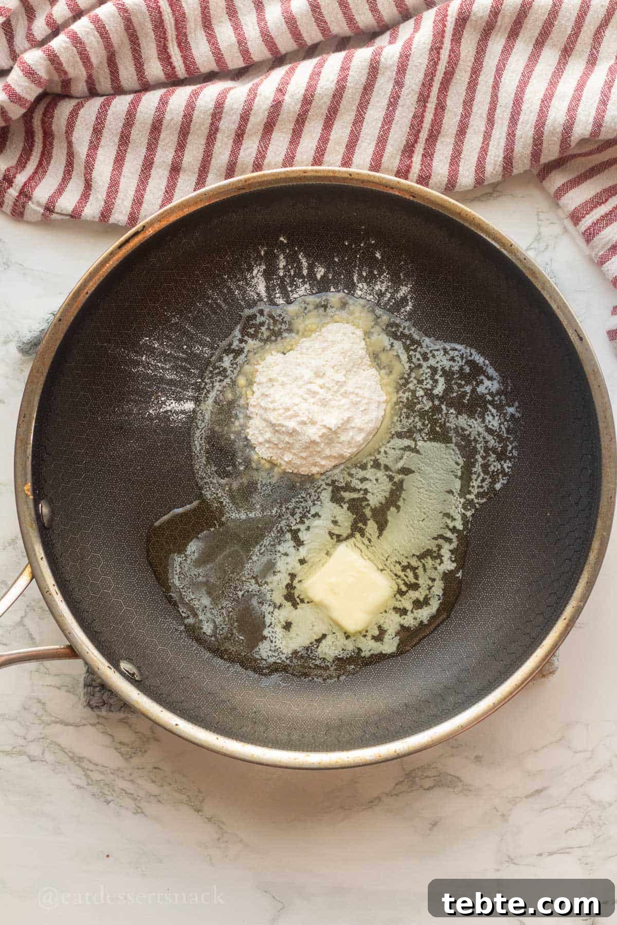 Homemade Brown Gravy Recipe for Roast and Mashed Potatoes 4 Flour and butter in metal pan.