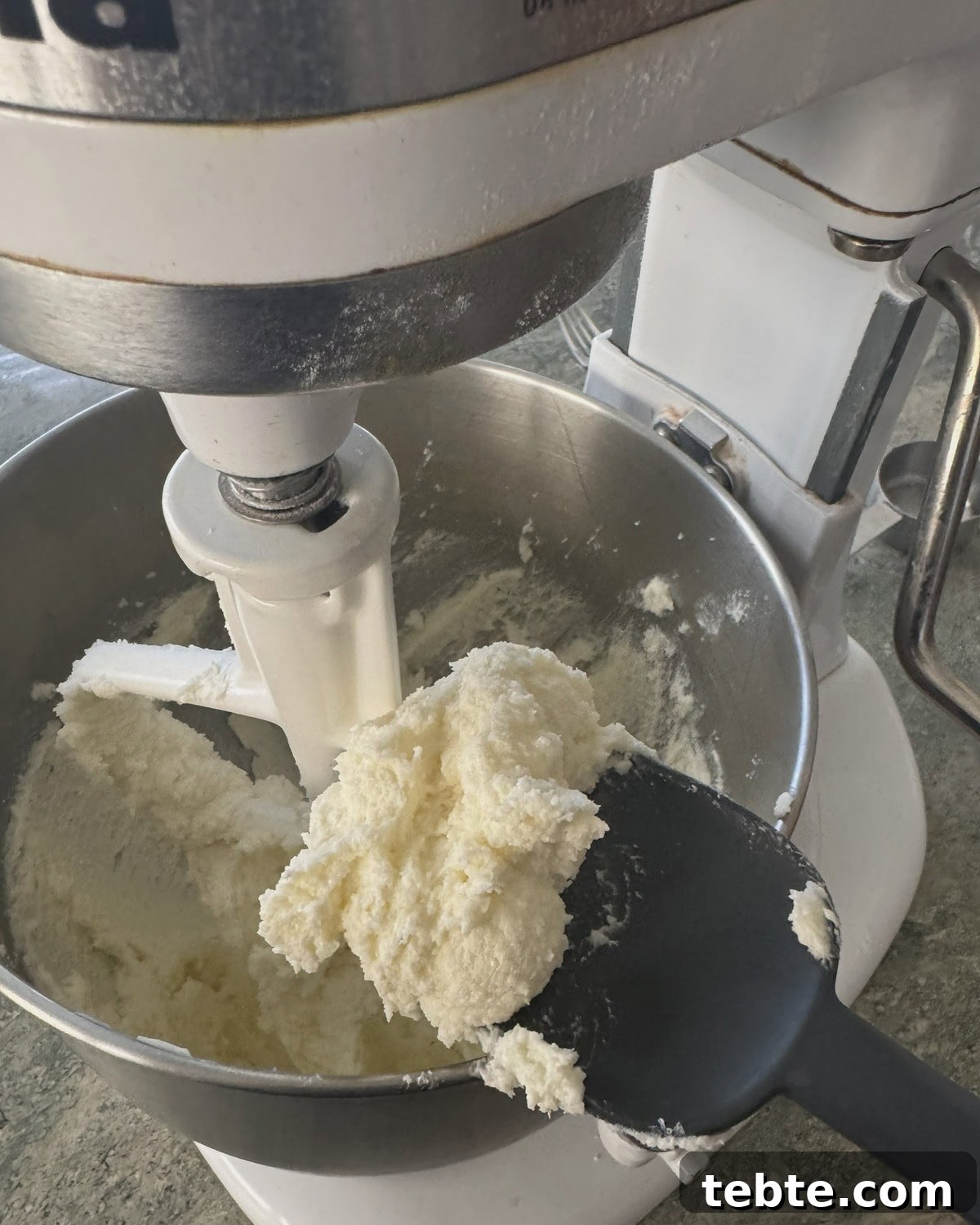 Sheet-Pan Scone Cake Recipe 5 A spatula with creamed butter and sugar.