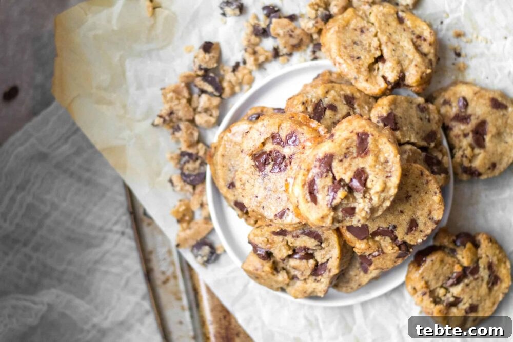 Coffee Chocolate Chunk Shortbread Cookies 2 coffee chocolate chunk cookies in a pile on a plate