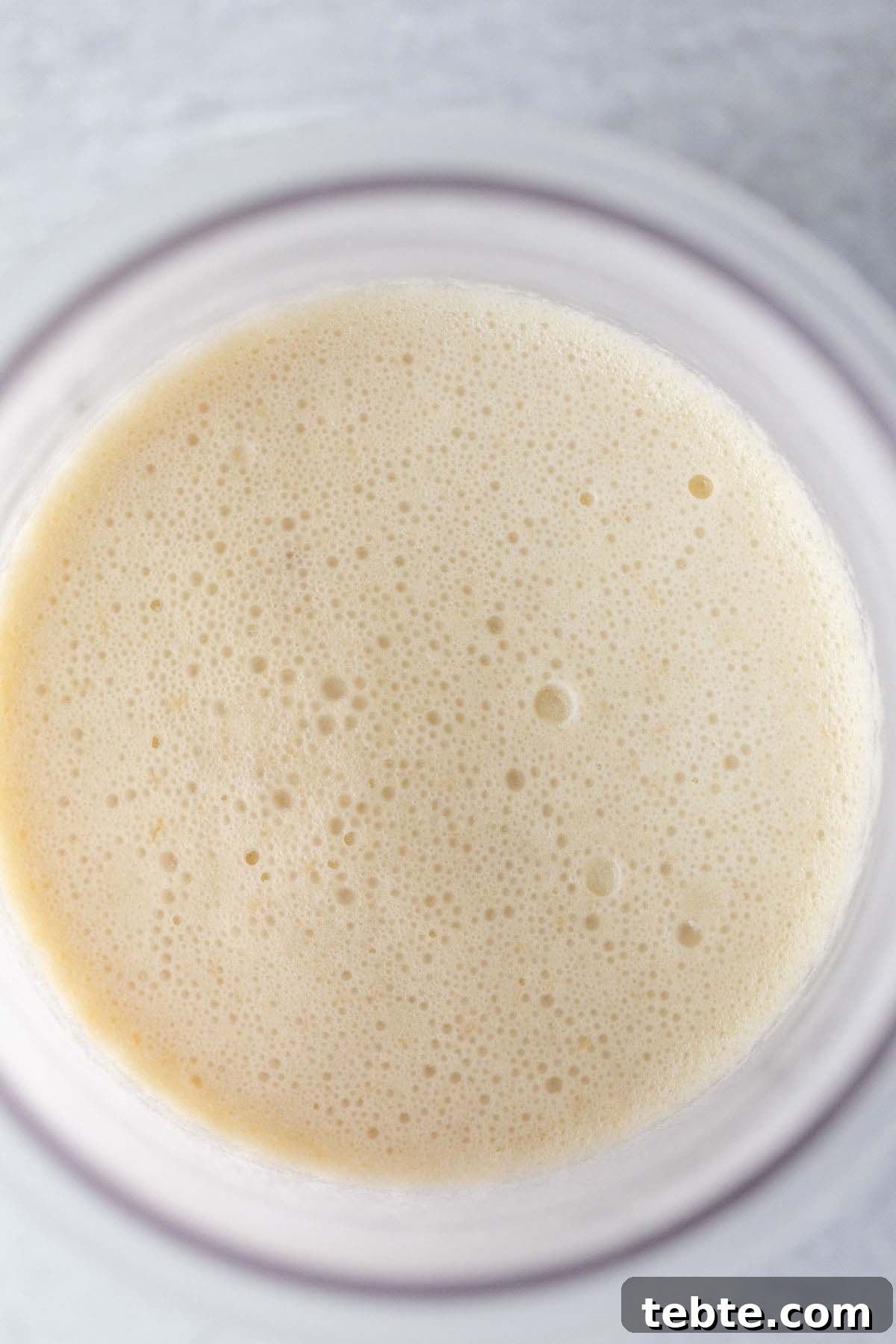 Banana Cream Pie Ice Cream Recipe for Ninja Creami 6 Frozen banana ice cream in Ninja Creami container