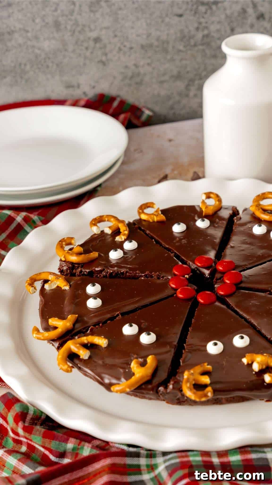 Reindeer Christmas Brownies Recipe for Festive Treats 6 Fudgy Christmas brownies decorated with ganache with reindeer faces.