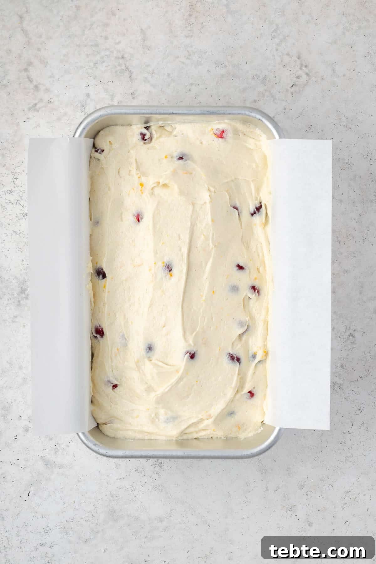 Classic Cranberry Orange Pound Cake Recipe 11 Cranberry orange pound cake batter spread into a loaf pan.