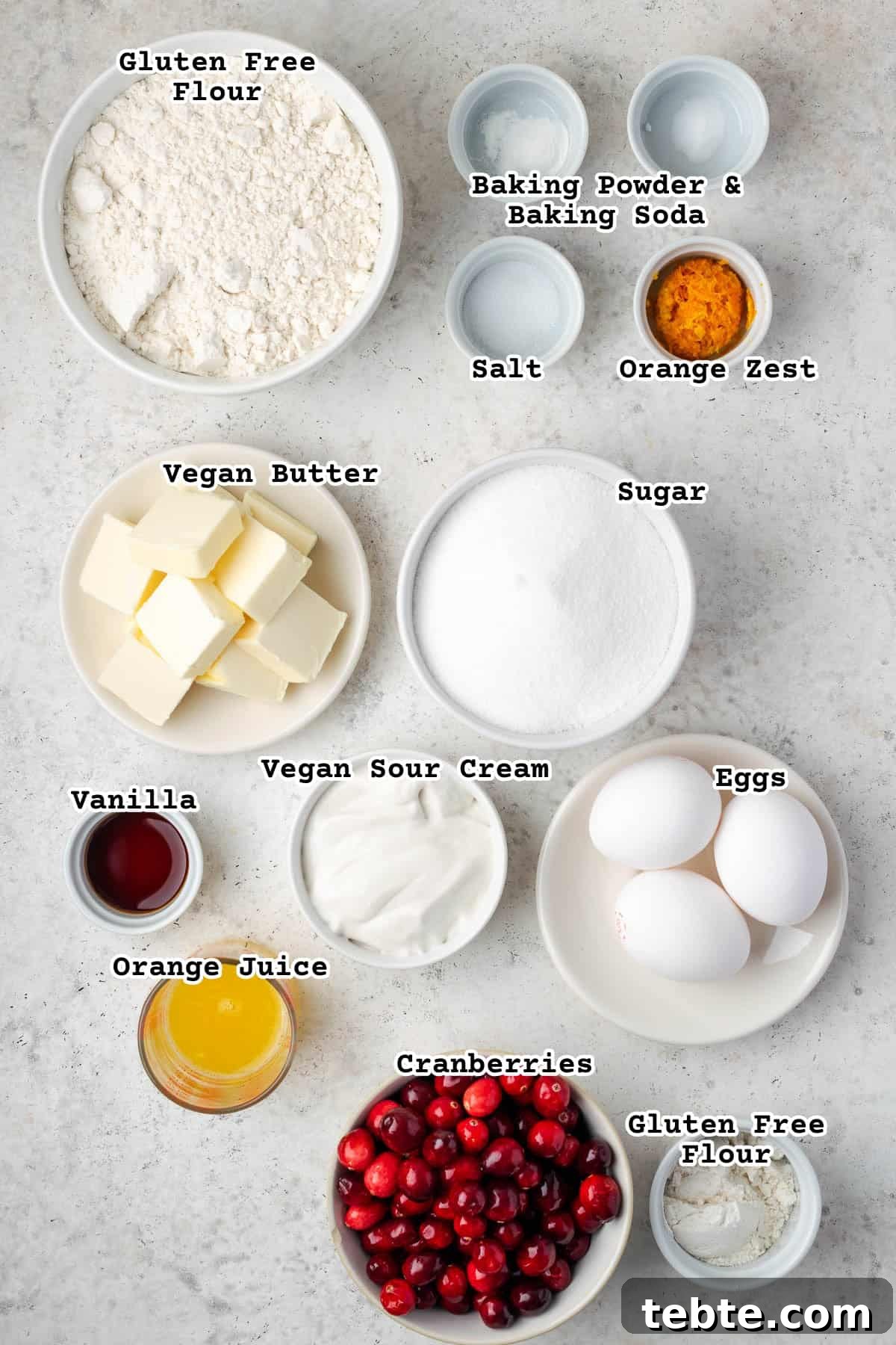 Classic Cranberry Orange Pound Cake Recipe 3 Ingredients for cranberry orange pound cake sitting on a counter.